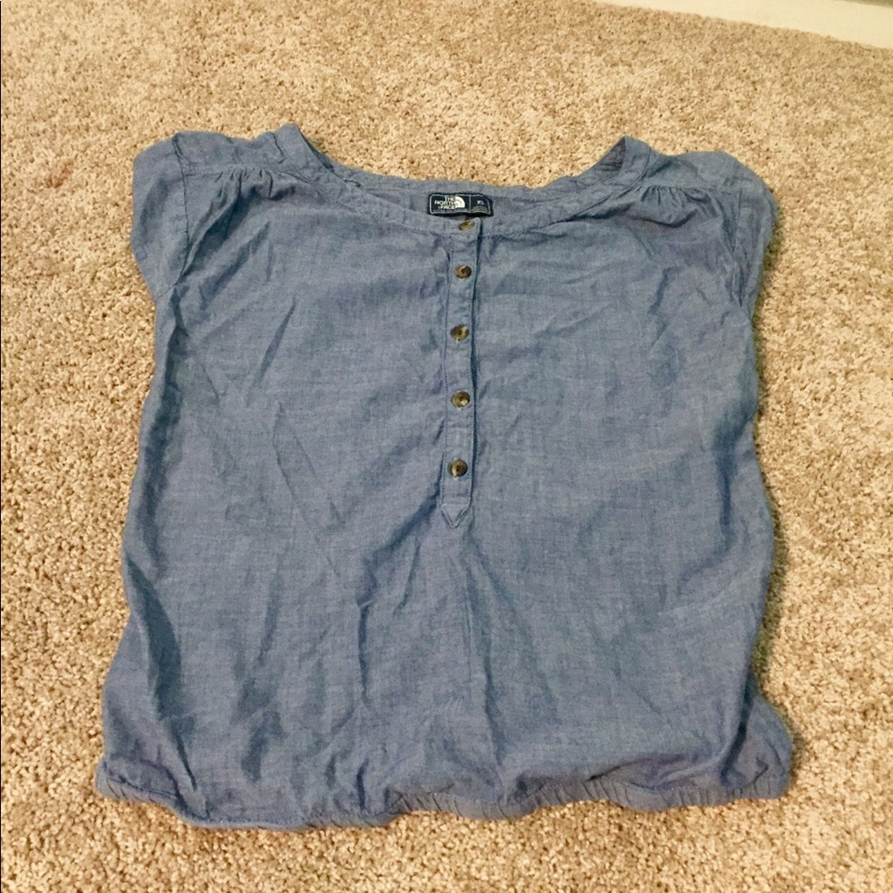 The North Face blue shirt size Adult XS